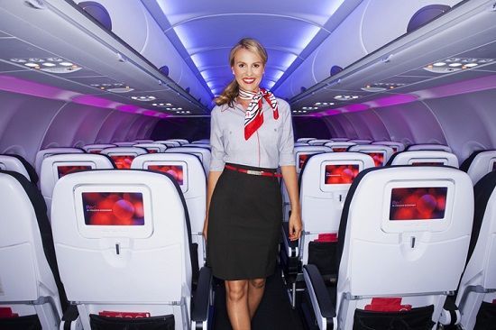 Flight attendant from Virgin America shows new uniforms