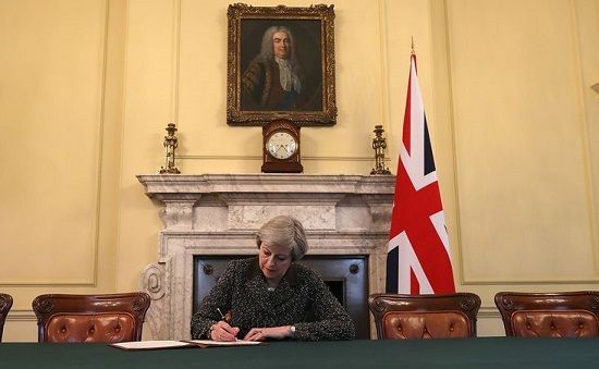 U.K. PM Theresa May signs Brexit “divorce” papers